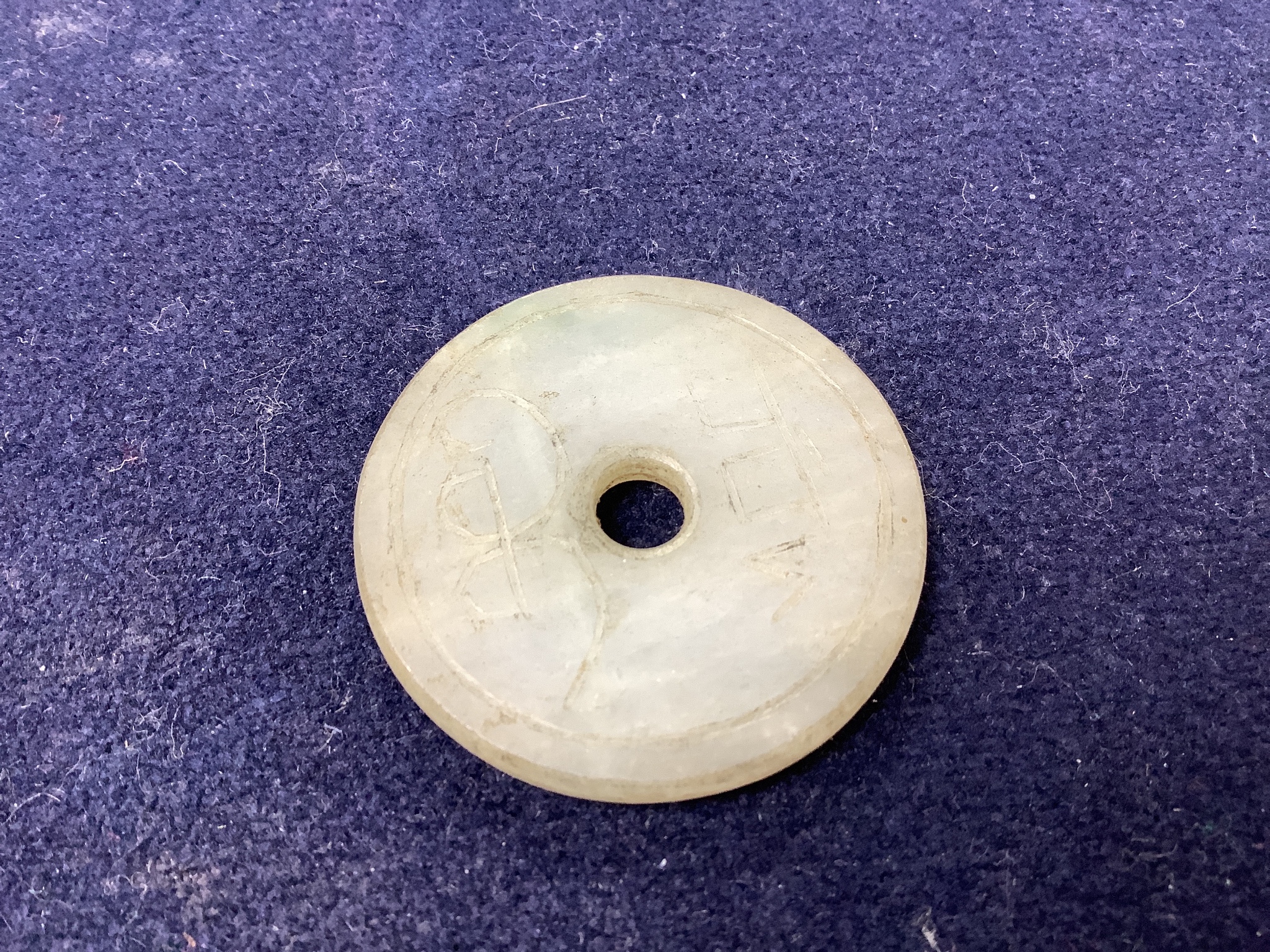 A group of Asian and other small collectables, white metal, brass, jade etc.